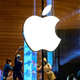 The Apple logo is seen on a window of the company’s store in Bangkok on February 14, 2021.